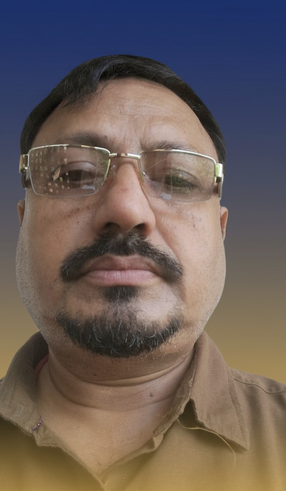 Close-up of a man with glasses, black mustache, and goatee wearing a brown collared shirt, against a blue to golden gradient background.