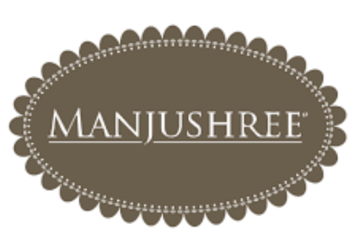 Manjushree brand name inside a brown scalloped oval frame.